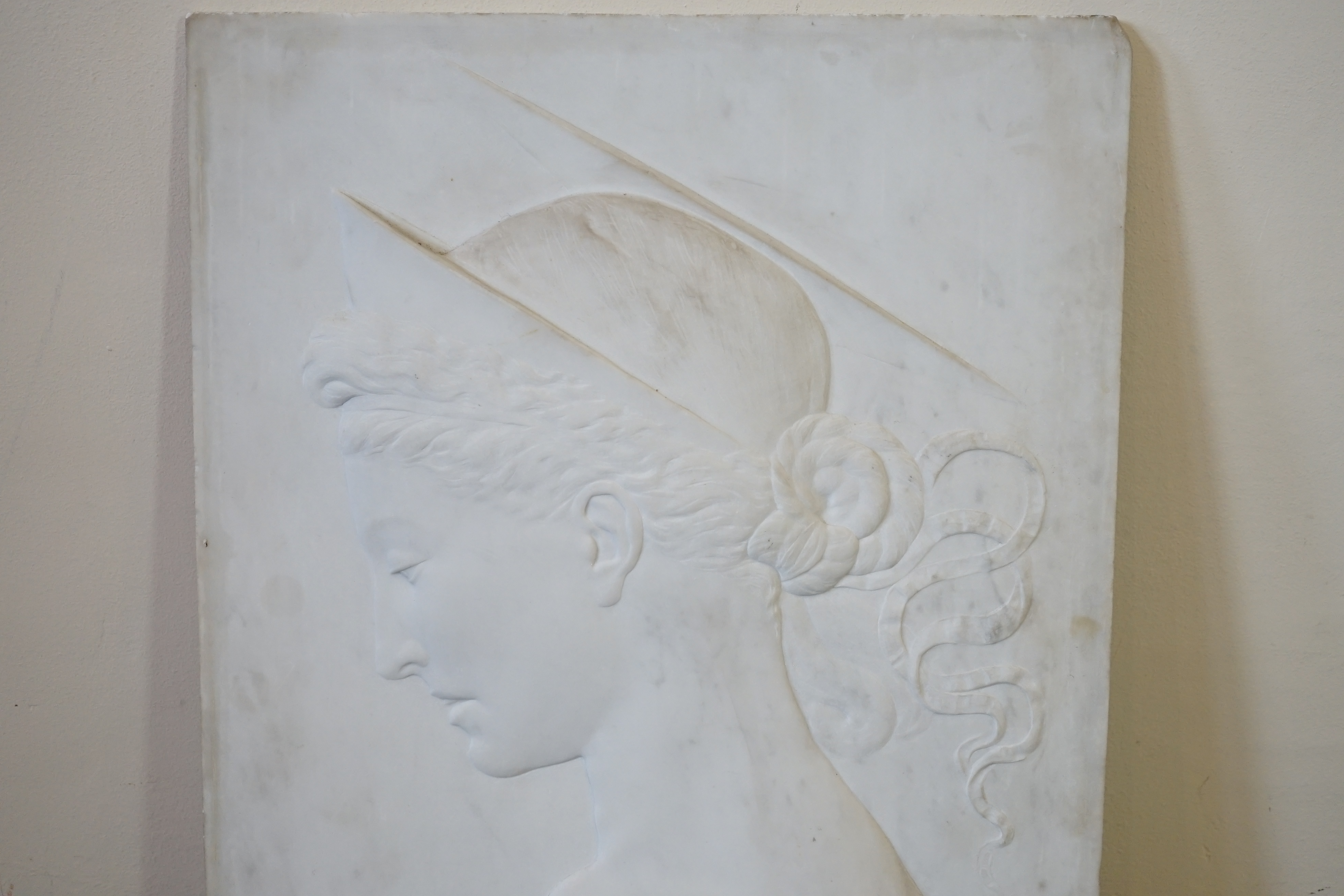 After Desiderio da Settignano (1429-1464), an early 20th century rectangular marble relief plaque of Flavia Julia Helena, or Saint Helena